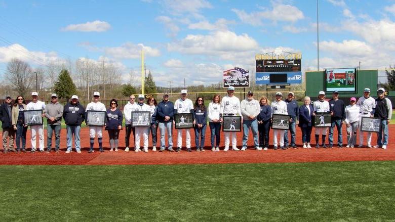 The senior members of the baseball team at Penn State DuBois, along with their family members, during their senior day recognition at Showers Field in DuBois.